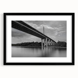 Abstract art print featuring vibrant, colorful textures, mounted in a black frame with mat, ideal for living room decor.