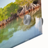Large abstract wall art of the Florida Keys in muted blue and green tones on acrylic glass.