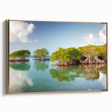 Framed canvas featuring a vintage-style landscape painting of the Florida Keys in muted gold and black tones.