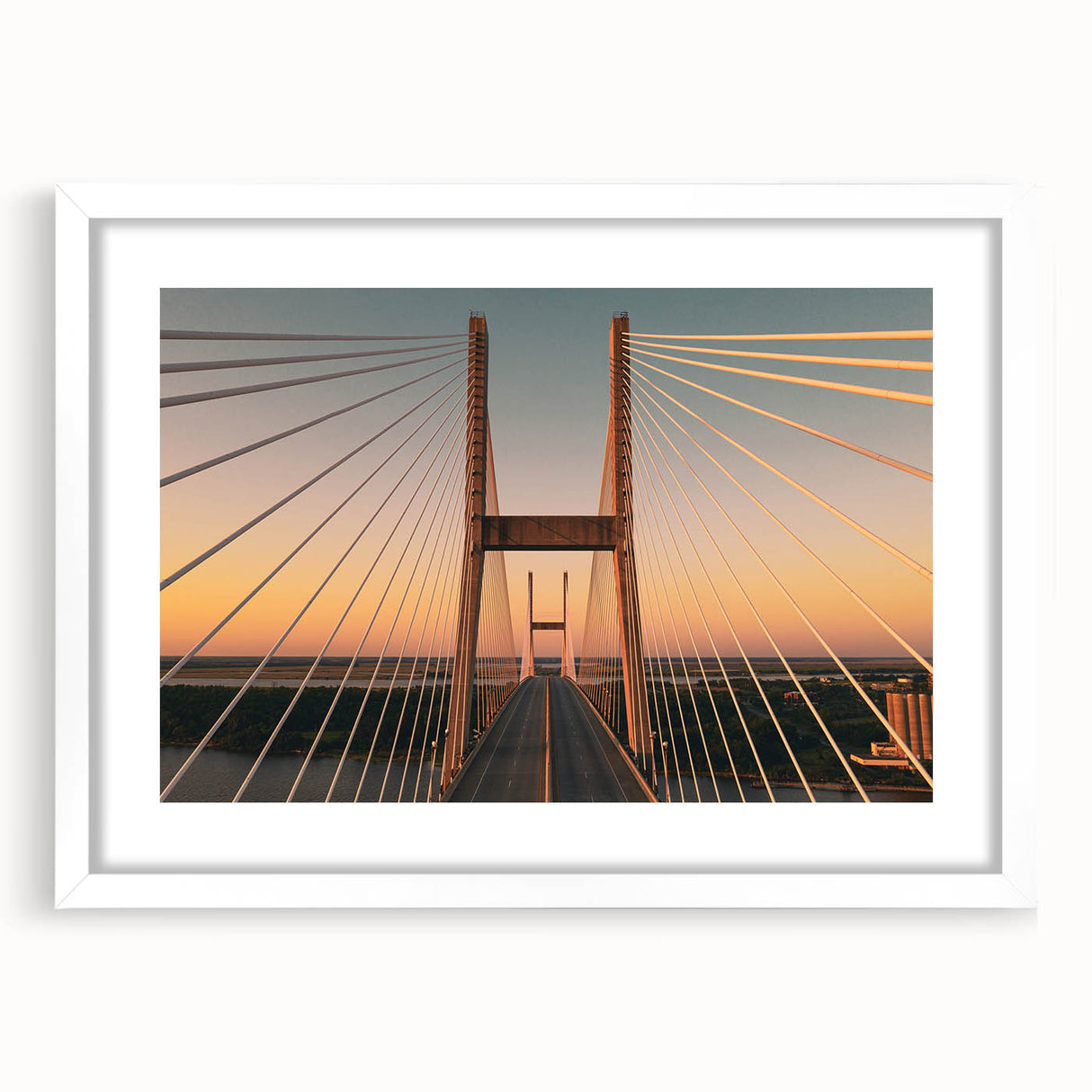 Abstract art print of Savannah landscape in muted green and brown tones on a white framed canvas.