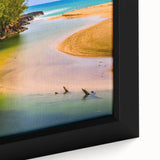 Black wall art featuring a textured close-up of Kauai's scenery in vibrant colors on a framed canvas.