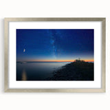 Textured art of abstract Lake Michigan in muted blue and gray tones on a framed canvas, suitable for bedroom decor.