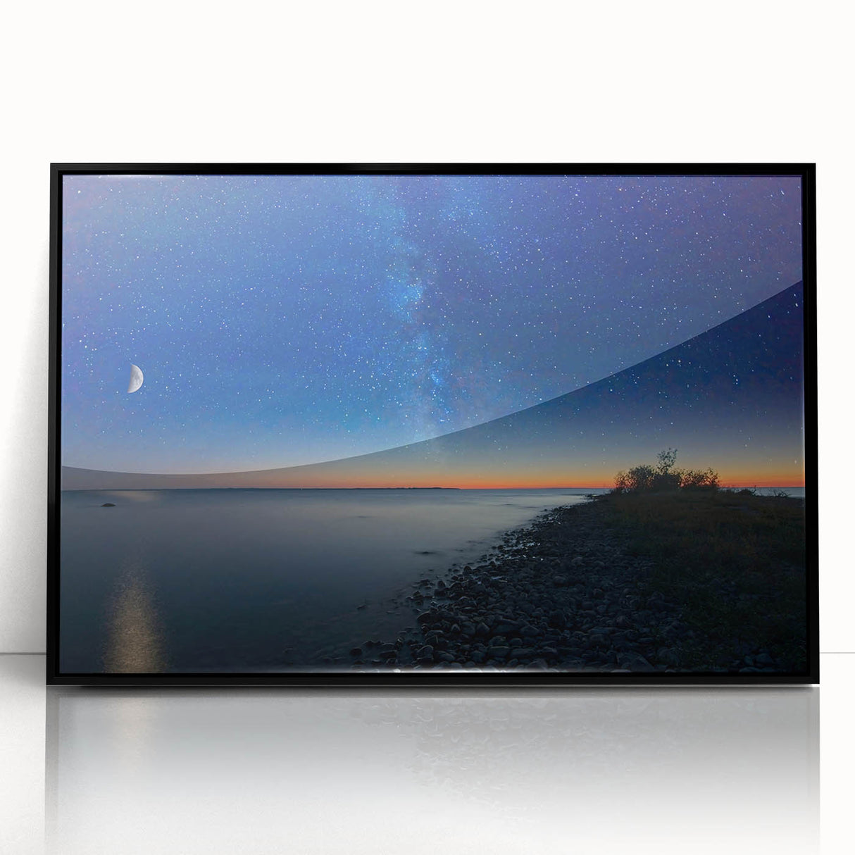 Large abstract wall art of Lake Michigan with muted blue and gray tones, framed in black acrylic.