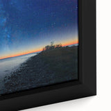 Black wall art featuring a textured depiction of Lake Michigan, in vibrant colors on a large framed canvas.