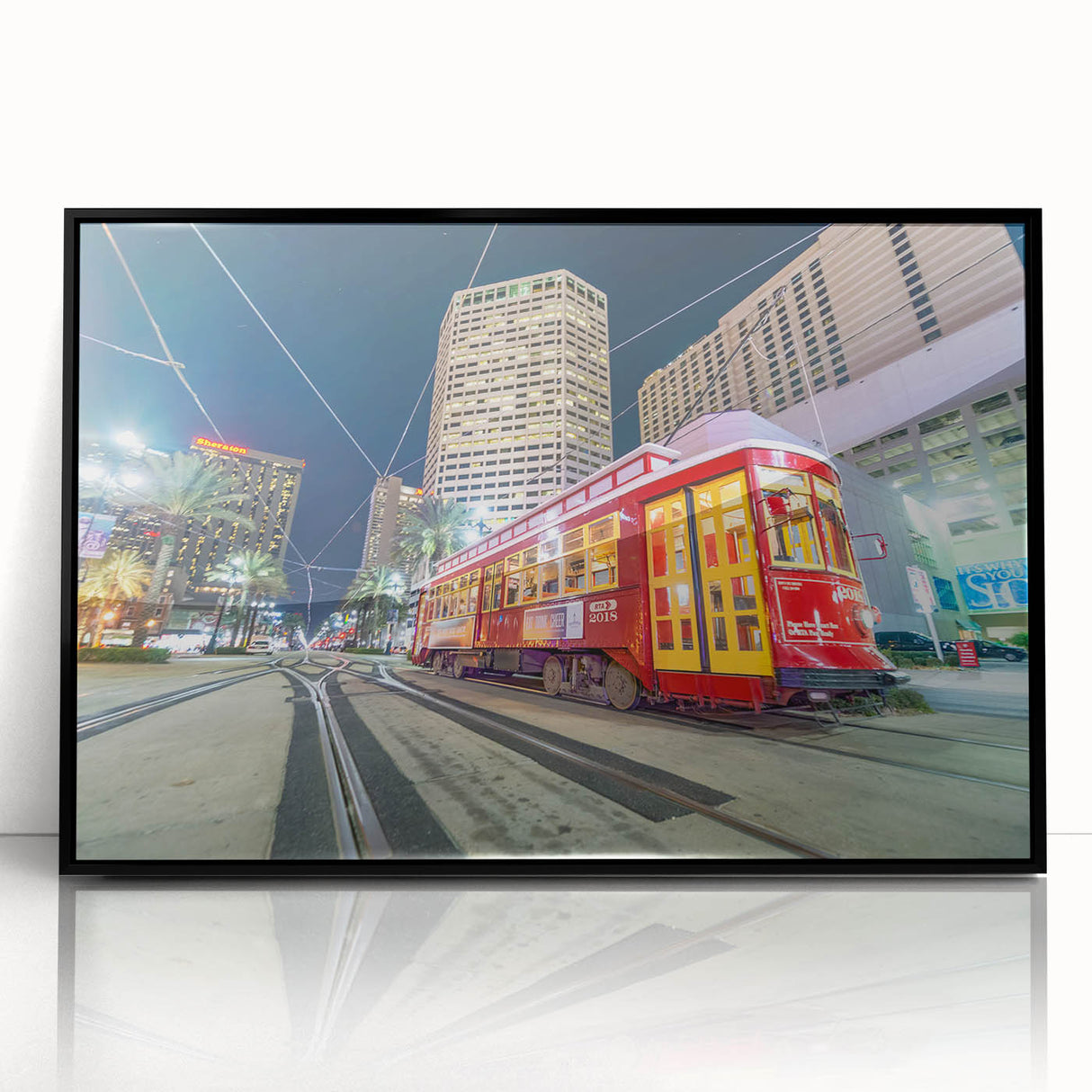 Large abstract wall art depicting a colorful New Orleans scene in mid-century modernist style on black framed acrylic.