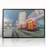 Large abstract wall art depicting a colorful New Orleans scene in mid-century modernist style on black framed acrylic.