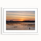 Abstract art print depicting a Louisiana landscape in muted earth tones on a framed white mat, ideal for dining room decor.