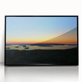 Large abstract wall art depicting Acadia's rugged coastline in muted earth tones on a black framed acrylic print.