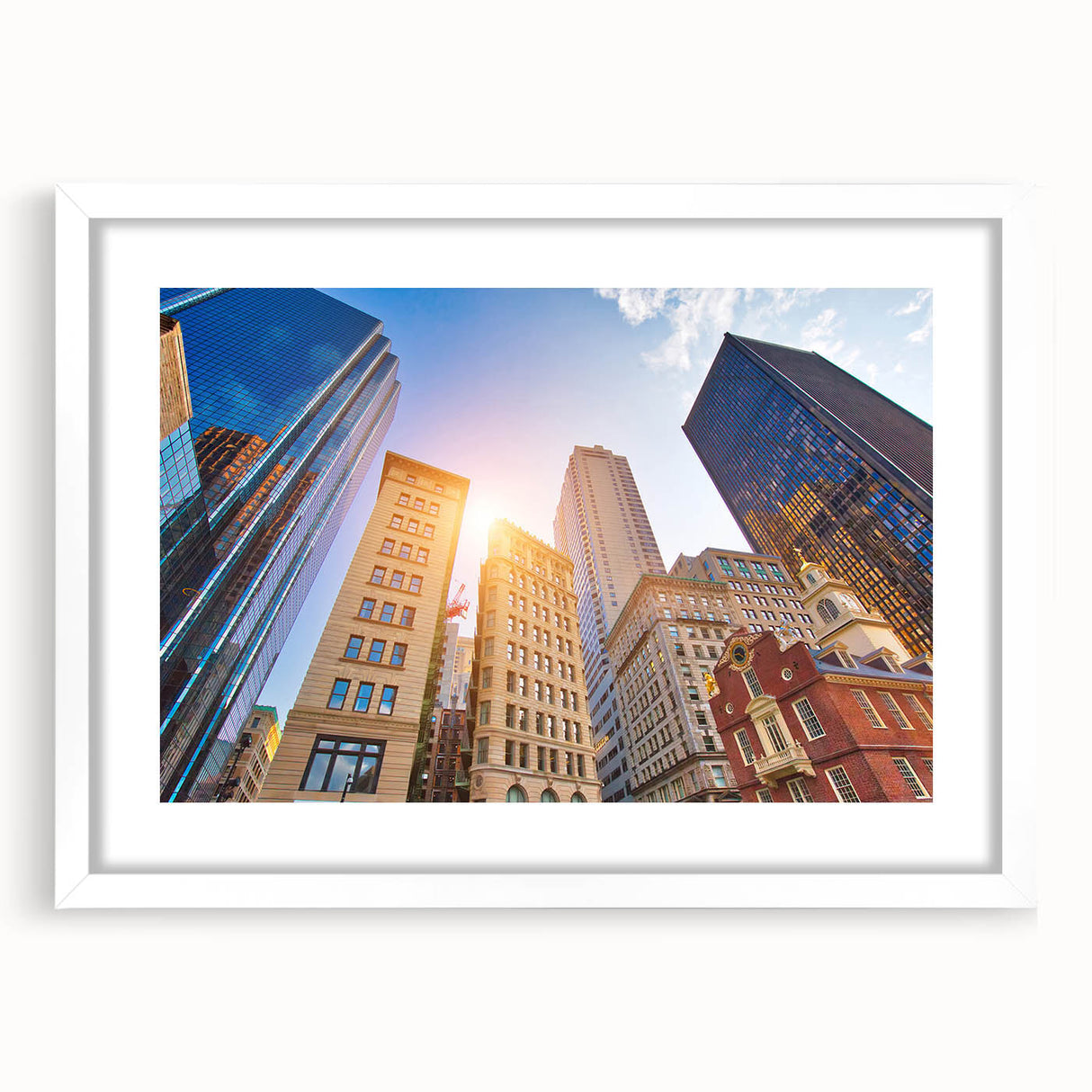 Abstract art print of Boston skyline in muted blue and gray tones on a framed white mat, suitable for dining room decor.