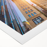 Art deco poster of Boston skyline in muted blue tones on rolled canvas, suitable for dining room wall art.