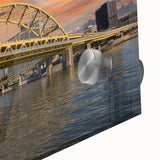 Large abstract depiction of Pittsburgh skyline in muted gray and blue on acrylic glass, suitable for dining room art.