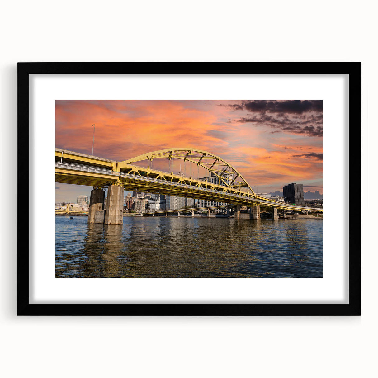 Colorful abstract art print of Pittsburgh skyline in vibrant hues on a large textured canvas, ideal for living room decor.