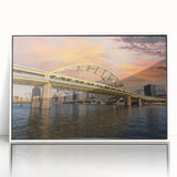 Framed acrylic print of Pittsburgh skyline in art deco style with muted gray and blue tones.