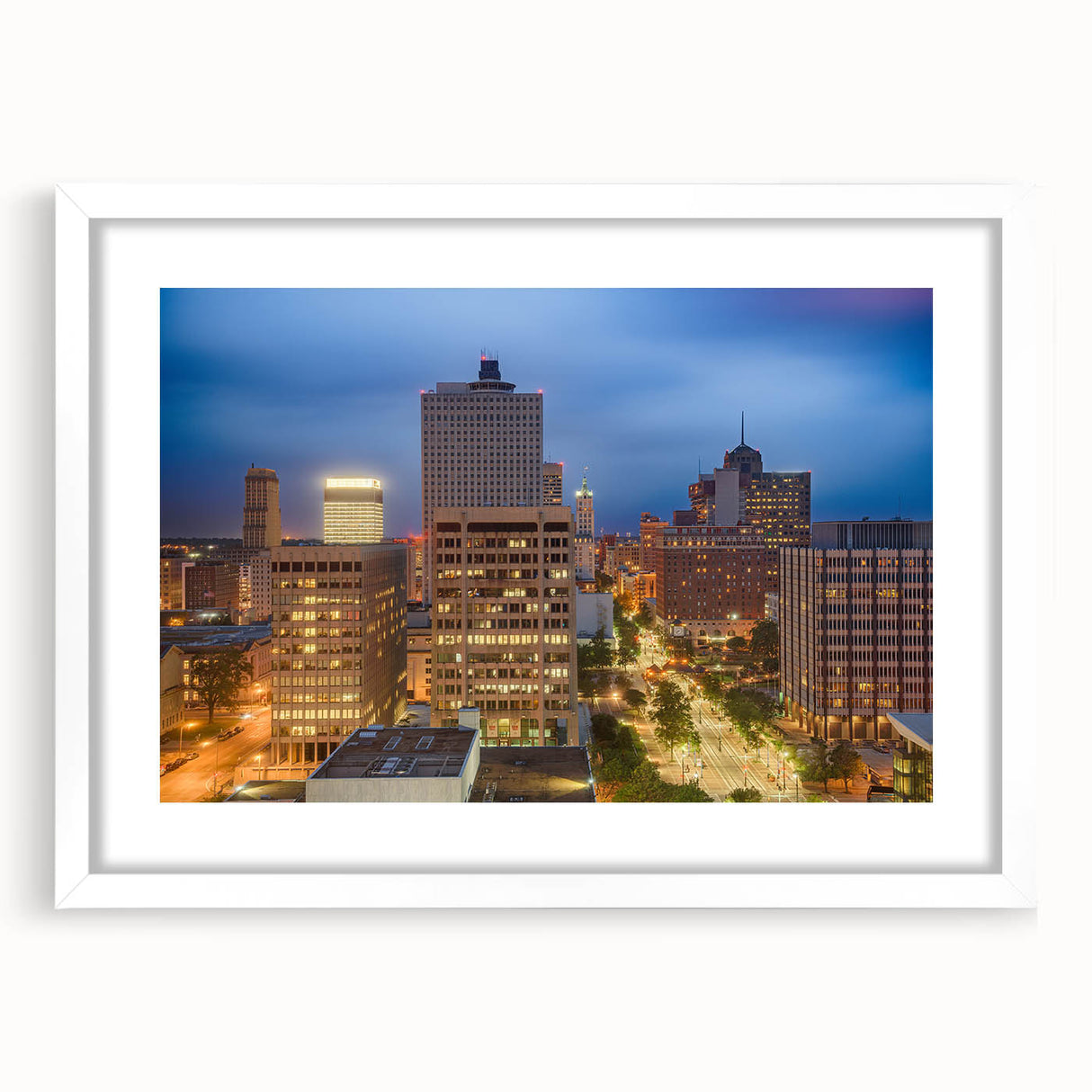 Abstract art print of Memphis skyline in muted blue and gray tones on a white framed poster, suitable for dining room decor.
