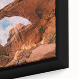 Framed canvas of Arches National Park in Utah, featuring textured black and colorful art, ideal for living room decor.