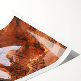 Extra large wall art featuring a line art design of flowers, in black and white on a rolled print.