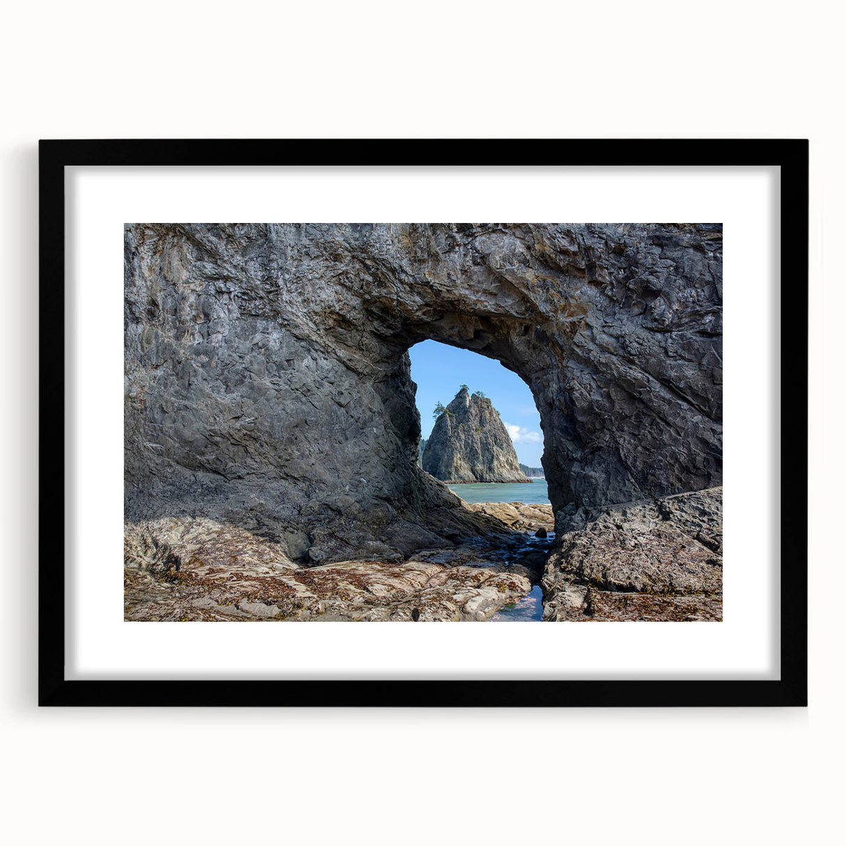 Abstract art print of Olympic scenery with textured, colorful elements on a large framed black canvas.