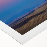 Art deco poster of Palouse, Washington, featuring rolling hills in muted greens and browns on a rolled canvas.