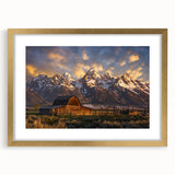 Extra large wall art featuring an abstract depiction of the Grand Tetons in textured hues of blue and gray, framed in gold.
