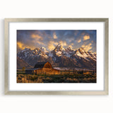 Textured art print of Wyoming's Grand Tetons in muted earth tones, framed in silver, ideal for bedroom art.
