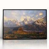 Large abstract wall art depicting the Grand Tetons in muted earth tones, framed in black acrylic.