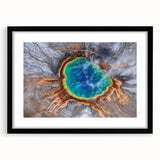 Colorful abstract art print of Yellowstone, featuring vibrant hues and textures, framed in black.