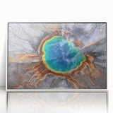 Acrylic print of Yellowstone scenery in muted earth tones, framed in white, suitable as modern art wall decor for a nursery.