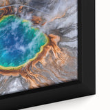 Black wall art featuring a textured close-up of Yellowstone scenery, in vibrant colors on a framed canvas.