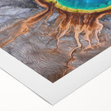 Art deco poster of Yellowstone scenery on rolled canvas, featuring muted earth tones, ideal for dining room wall art.