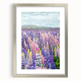 Textured abstract art print depicting spring, with vibrant green and yellow tones on a framed silver mat.