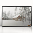 Large abstract wall art depicting a winter scene in muted blue and white tones on framed acrylic.
