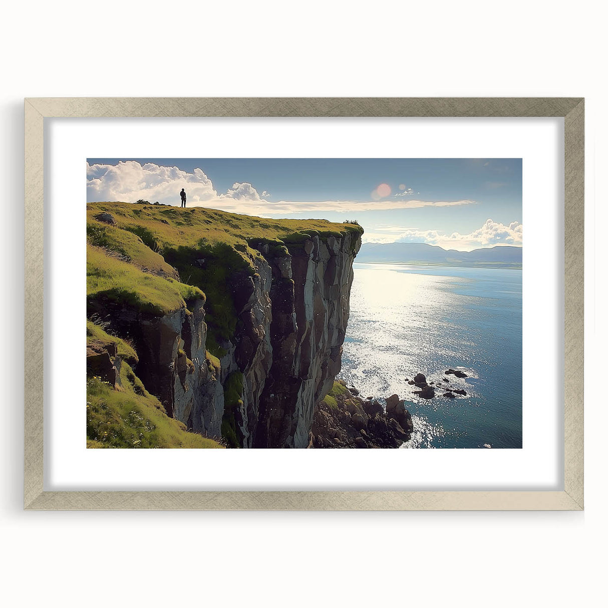 Silver-framed landscape artwork depicting dramatic cliffs, enhanced with a mat for added elegance, ideal for home decor or gallery display.