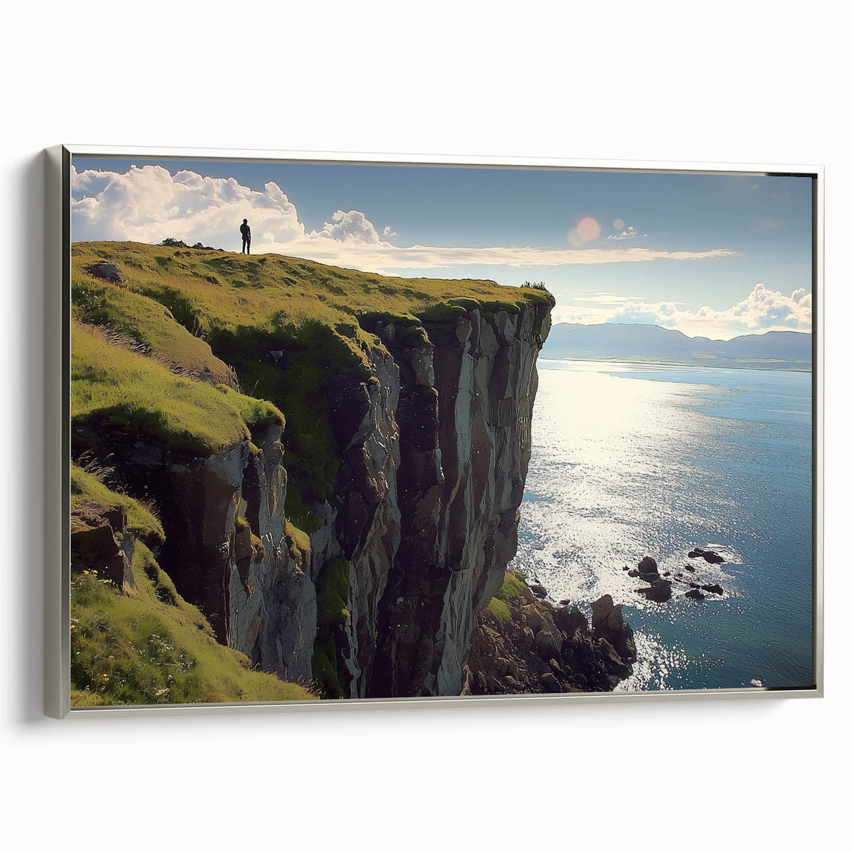 Framed canvas artwork showcasing a scenic cliff landscape, displaying vibrant colors and intricate details, complemented by a sleek silver frame, ideal for home decor.