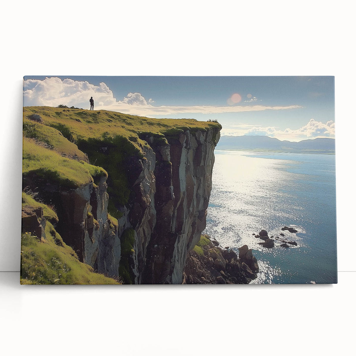 Stretched canvas artwork showcasing a breathtaking landscape of dramatic cliffs against a vibrant sunset, perfect for enhancing home decor with natural beauty.