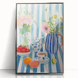 Large art print of colorful mid-century modernist food and drinks on silver-framed acrylic.