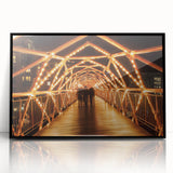 Framed acrylic artwork of a landscape bridge, showcasing vibrant colors and intricate details, set against a sleek black frame. Ideal for modern home decor.