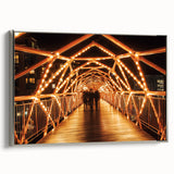 Framed landscape canvas art depicting a serene bridge scene with silver accents, ideal for modern home decor. The artwork captures tranquility and elegance.