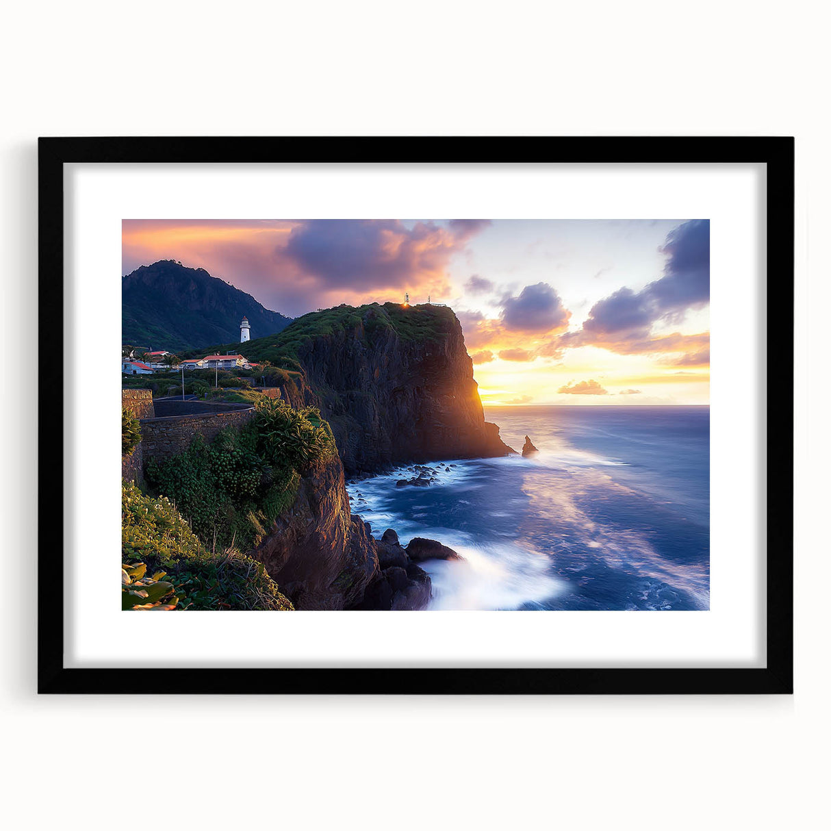 Framed black landscape artwork depicting dramatic cliffs, showcasing vibrant colors and intricate details, ideal for modern home decor. The mat adds elegance and depth.