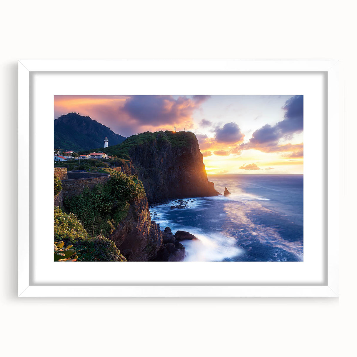 Framed landscape artwork of cliffs and ocean views, showcasing vibrant colors and intricate details, with a white mat and elegant frame for home decor enhancement.
