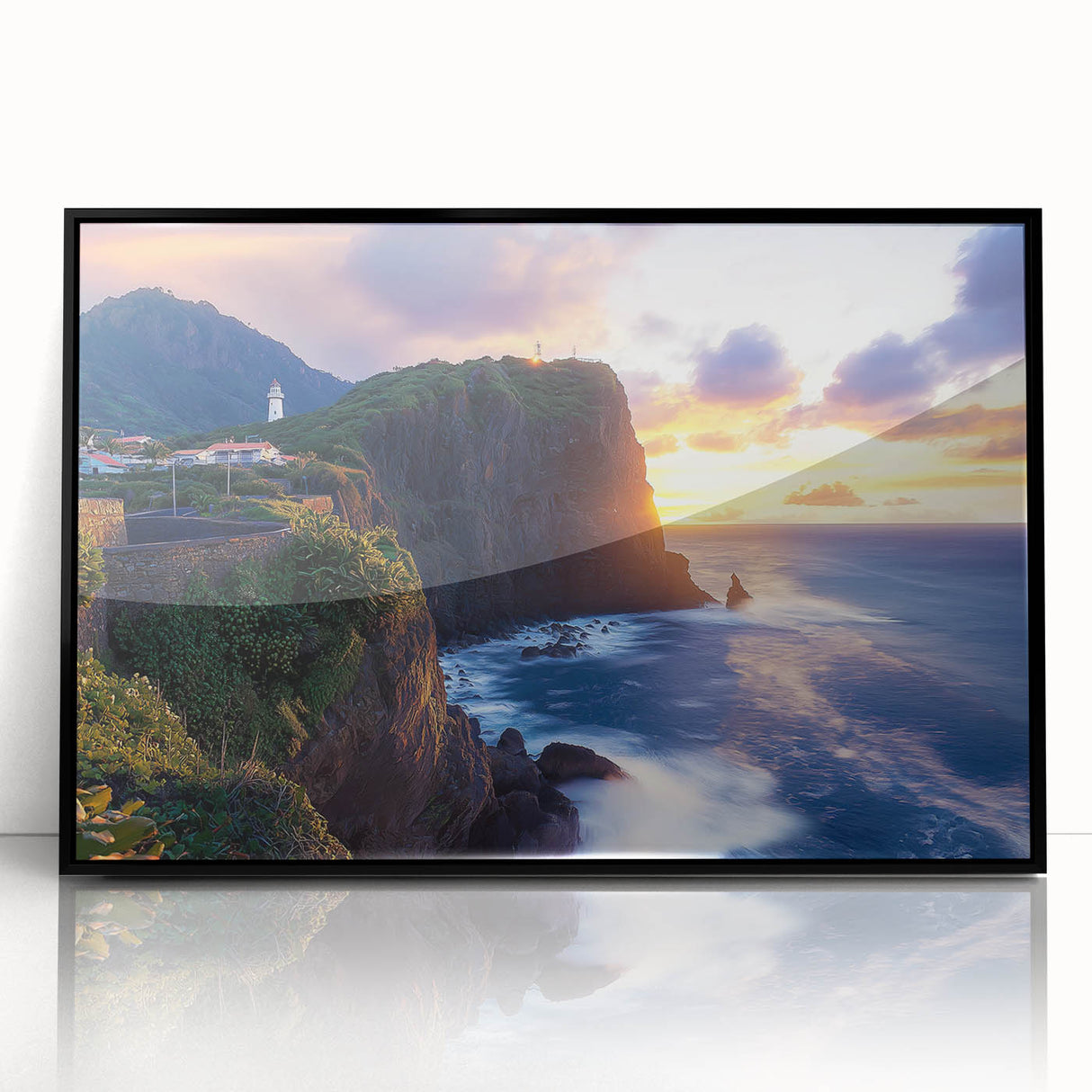 Framed acrylic artwork showcasing a dramatic cliff landscape in vibrant colors, set against a sleek black frame, perfect for modern home decor.