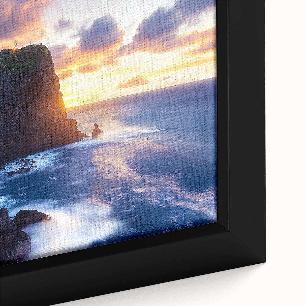 Close-up of a vibrant framed canvas depicting a dramatic cliff landscape, showcasing rich colors and intricate textures, perfect for home decor enhancement.