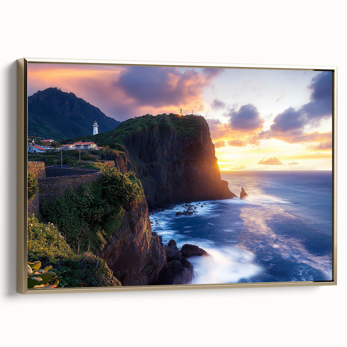 Framed canvas artwork depicting a serene landscape with majestic cliffs, highlighted by a gold frame, perfect for enhancing modern home decor.