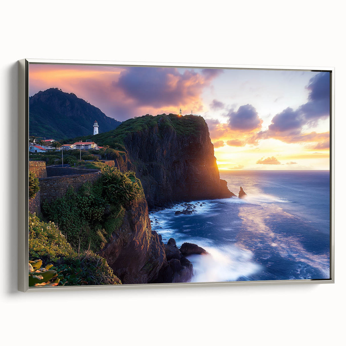Framed canvas artwork showcasing a dramatic cliff landscape with a silver border, perfect for enhancing modern home decor and adding a touch of elegance.