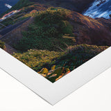 Vibrant rolled canvas artwork showcasing a stunning cliffside landscape with rich colors and intricate details, perfect for home decor or gallery display.