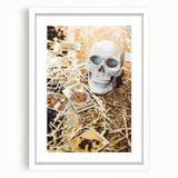 Abstract art print depicting autumnal trees in warm orange and red tones on a white framed canvas.