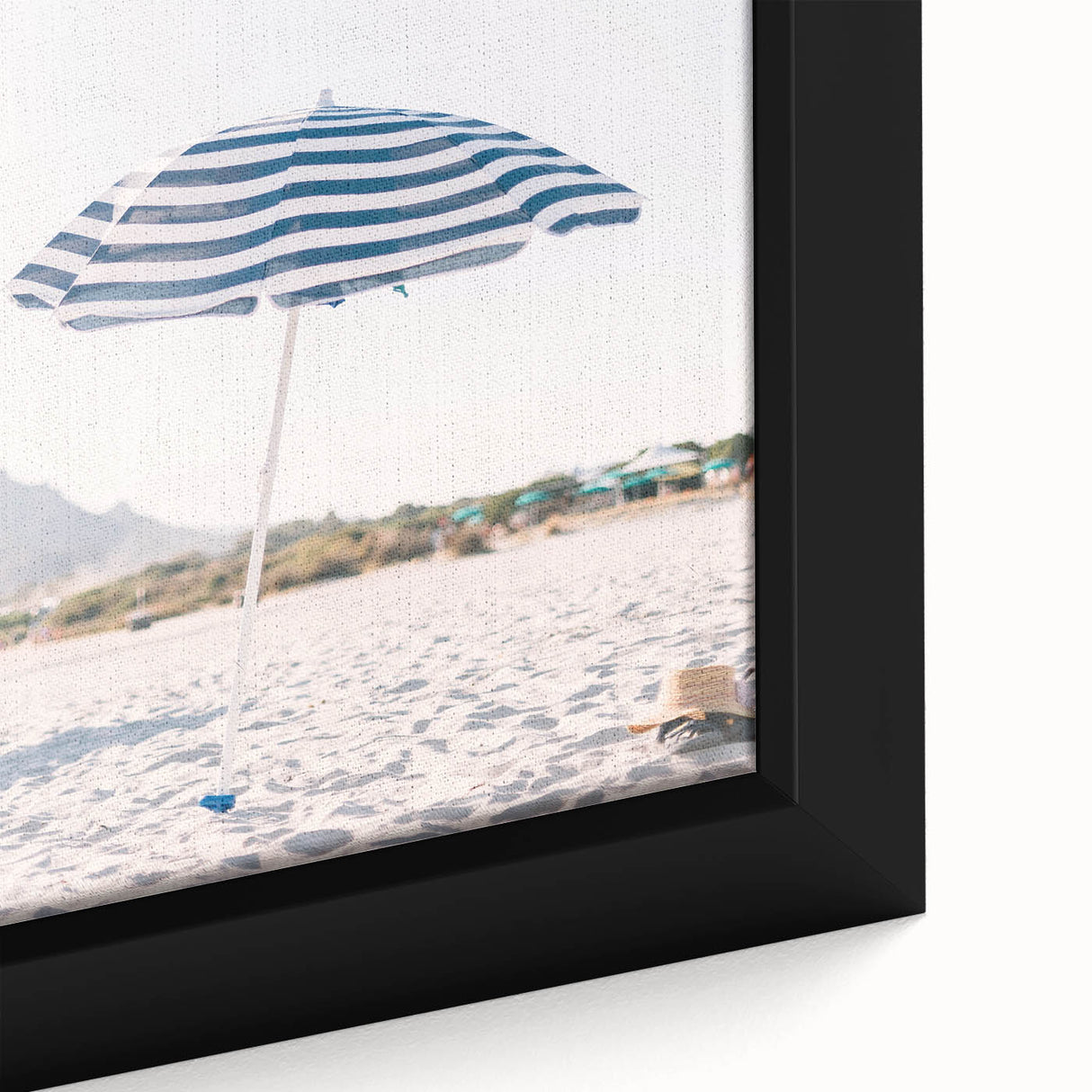Extra large framed canvas featuring a textured, colorful abstract design with black elements.