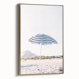 Framed canvas wall art depicting a summer landscape in vintage poster style, featuring gold and black tones.