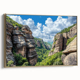 Framed canvas artwork depicting a breathtaking cliff landscape in warm gold tones, showcasing intricate details and a side view, perfect for home decor.