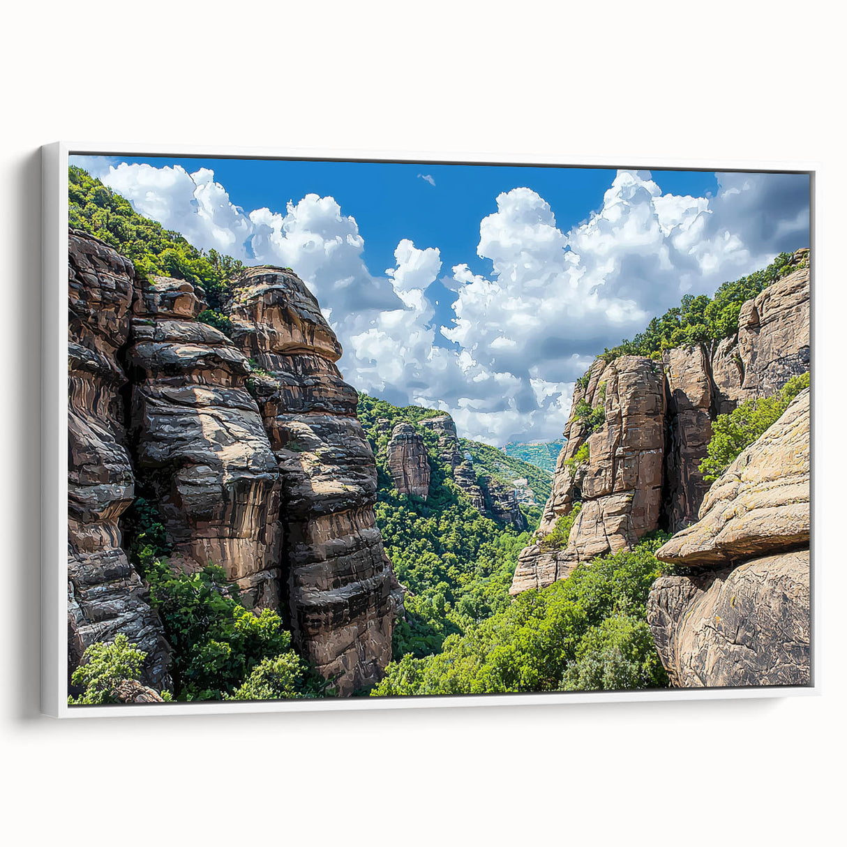 Framed canvas artwork depicting a breathtaking landscape of rugged cliffs under a blue sky, showcasing vibrant colors and intricate details. Perfect for home decor.