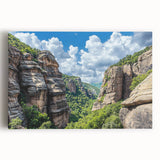 Stretched canvas artwork showcasing a breathtaking landscape of rugged cliffs under a vibrant sunset, perfect for modern home decor or art enthusiasts.